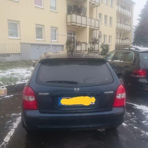 Gebraucht Mazda 323 88 PS (64 kW) 1999 Blau Limousine