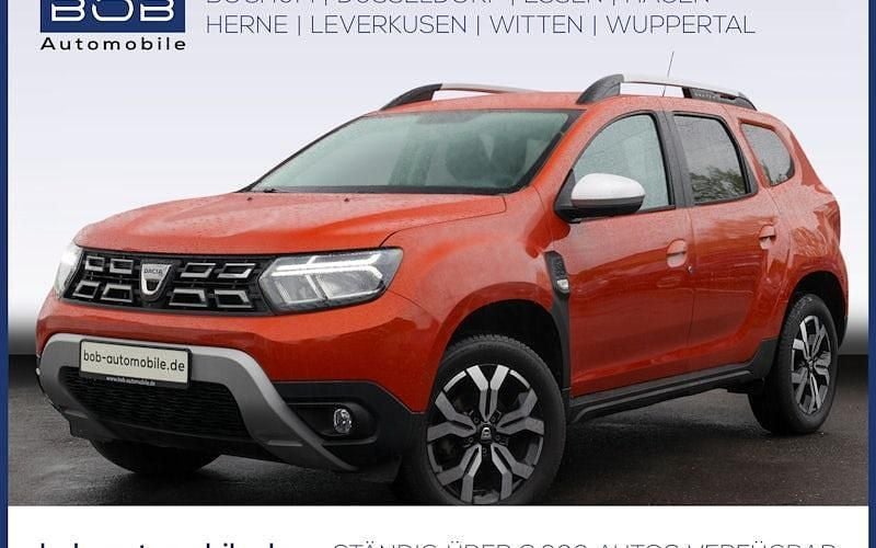 Arizonaorange (orange) (orange) Gebraucht 2022 Dacia Duster Prestige SUV | 18.777 € (Fairer Preis) - Bild 1/4