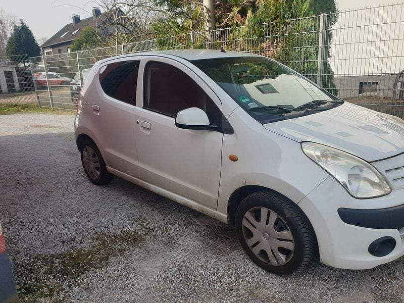 Gebraucht Nissan Pixo Acenta 68 PS (50 kW) 2010 Weiß Kleinwagen