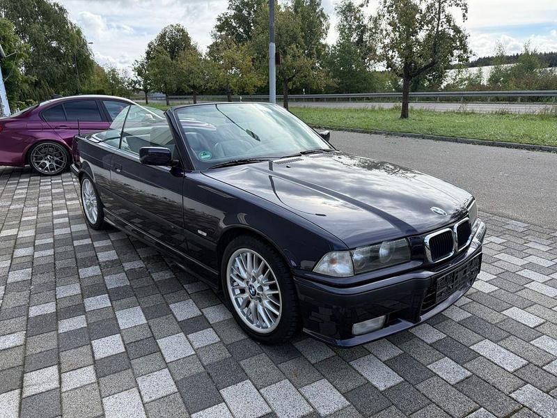 Violett Gebraucht 1997 BMW 320 Cabriolet Performance Cabrio | 10.900 € (Teuer) - Bild 1/4