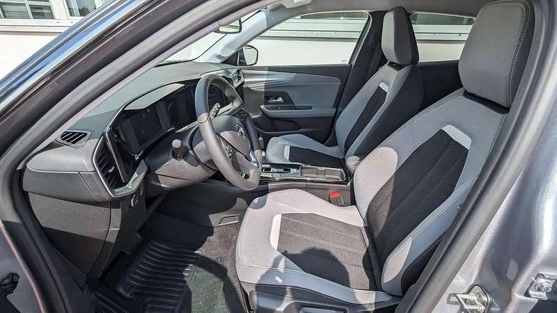 Gebraucht Opel Mokka-e Elegance 100 kW (136 PS) 2023 Kontrast grau SUV