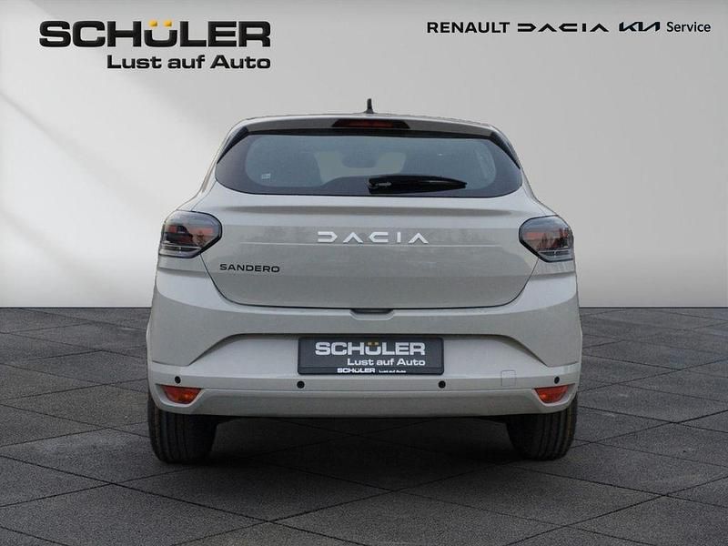 Neu Dacia Sandero Expression 101 PS (74 kW) 2026 Beige Limousine