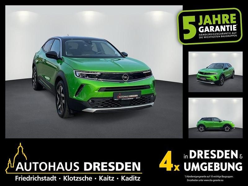 Gebraucht Opel Mokka-e Elegance 100 kW (136 PS) 2022 Matcha green (metallic) SUV