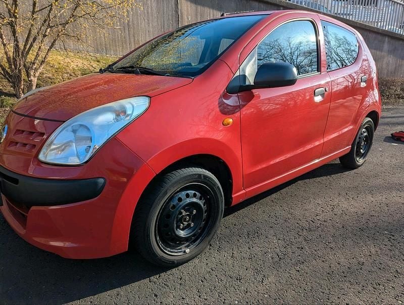 Gebraucht Nissan Pixo 68 PS (50 kW) 2010 Rot Kleinwagen