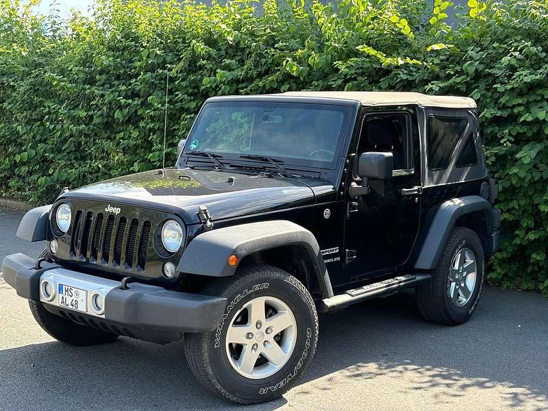 Black clear coat Gebraucht 2016 Jeep Wrangler Sport SUV | 21.999 € - Bild 1/4