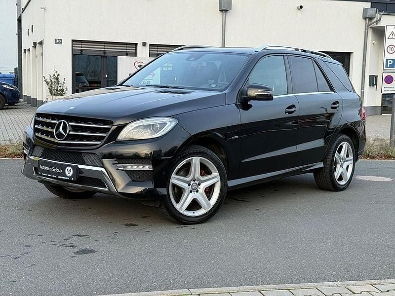 Obsidianschwarz metalliclack Gebraucht 2012 Mercedes ML350 AMG line SUV | 16.790 € (Superpreis) - Bild 1/4