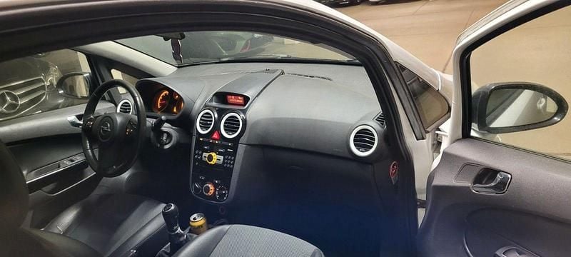 Second-hand Opel Corsa Sport 80 CP (58 kW) 2009 Alb Hatchback