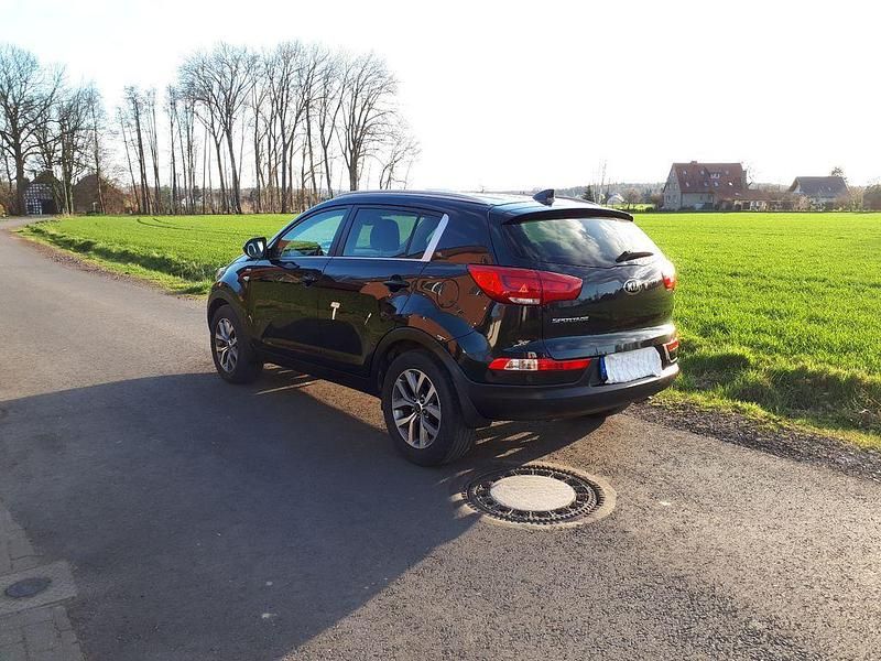 Schwarz Gebraucht 2015 Kia Sportage Vision SUV | 14.500 € (Teuer) - Bild 1/4