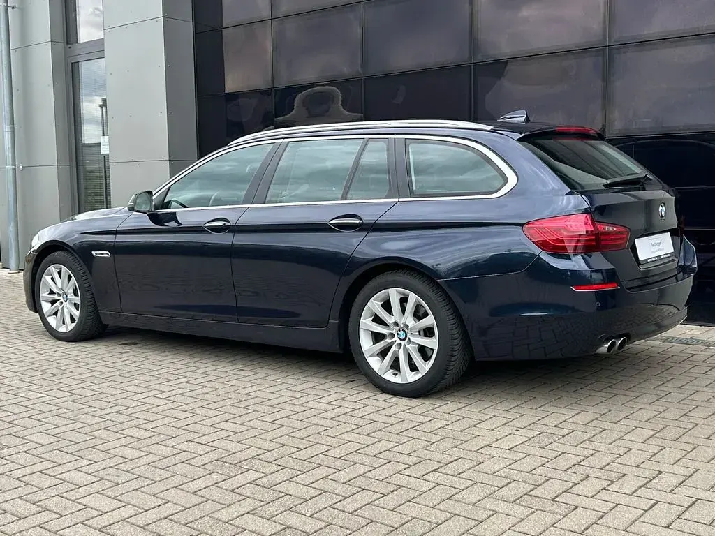 Gebraucht BMW 525 Comfort Edition 218 PS (160 kW) 2013 Blau Kombi