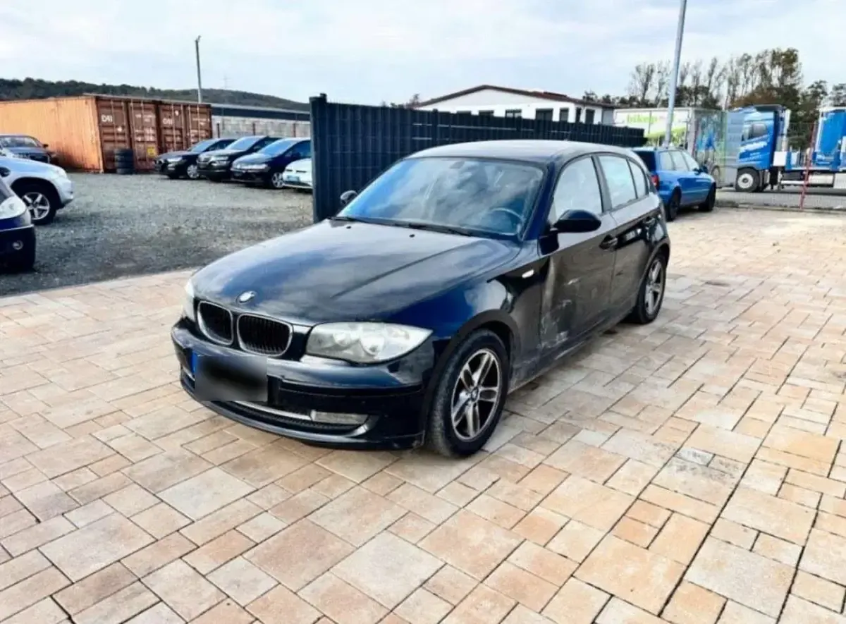 Gebraucht BMW 116 122 PS (89 kW) 2008 Schwarz Kleinwagen