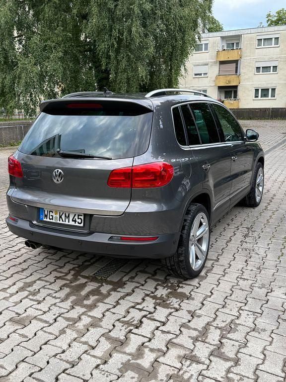 Grau Gebraucht 2013 VW Tiguan Exclusive SUV | 14.800 € (Fairer Preis) - Bild 1/4