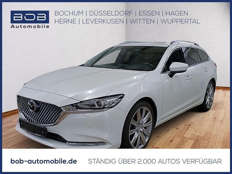 Rhodium white (weiß) Gebraucht 2024 Mazda 6 Takumi-Line Kombi | 31.450 € (Fairer Preis) - Bild 1/3