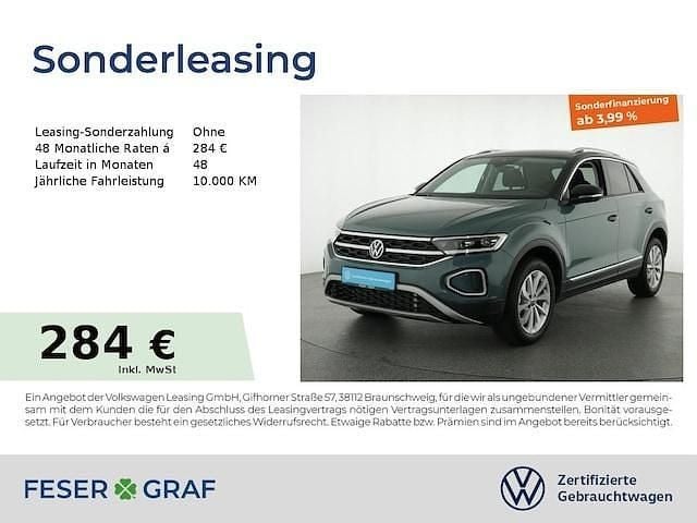 Petroleum blue metallic schwarz Gebraucht 2024 VW T-Roc Style SUV | 28.607 € (Superpreis) - Bild 1/2