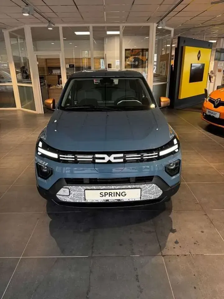 Käytetty Dacia Spring Extreme 47 kW (65 HP) 2024 Sininen Viistoperä