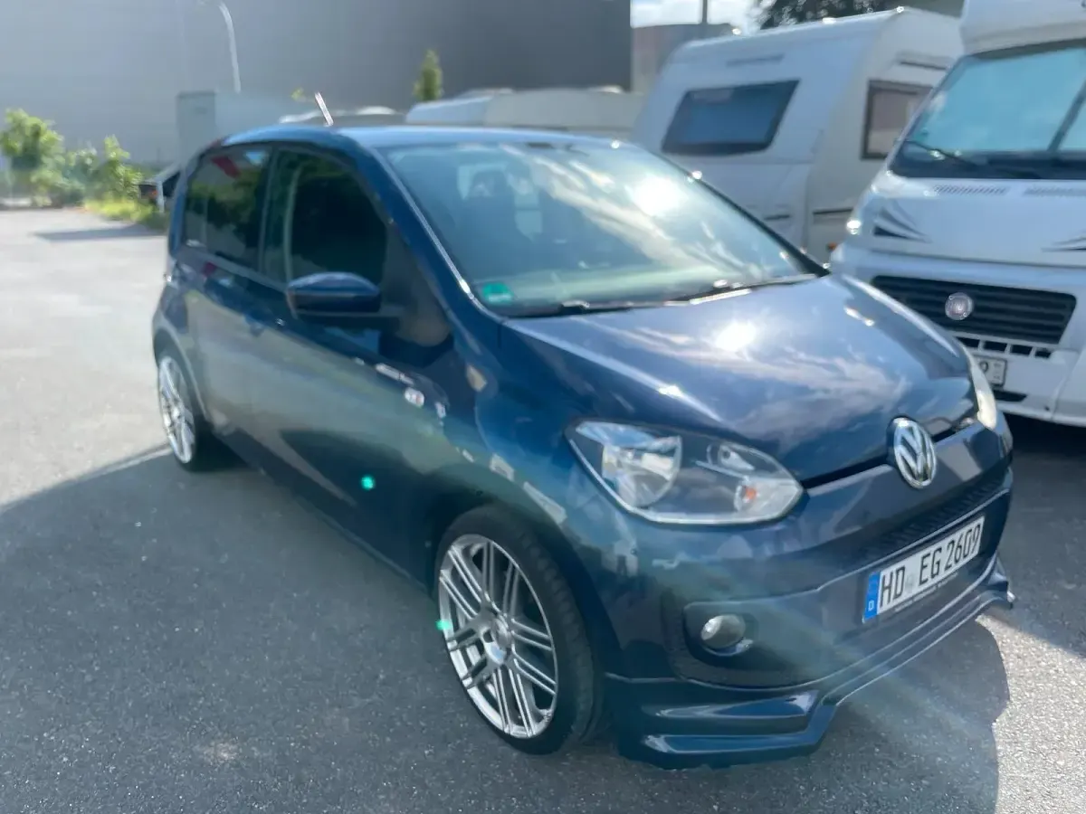 Używany VW up! 74 KM (54 kW) 2014 Niebieski Hatchback