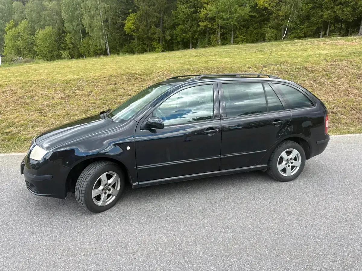 Używany Skoda Fabia 80 KM (58 kW) 2007 Czarny Kombi