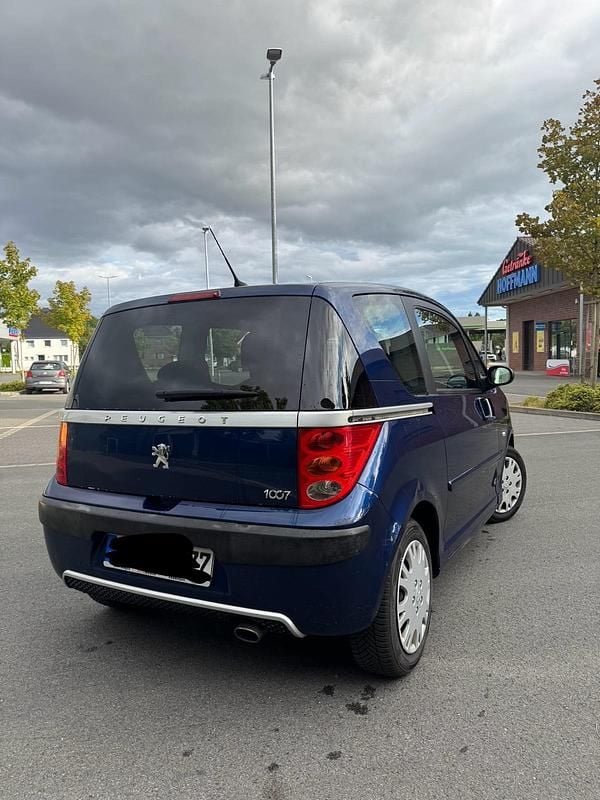 Blau Gebraucht 2007 Peugeot 1007 Kleinwagen | 2.600 € (Guter Preis) - Bild 1/4