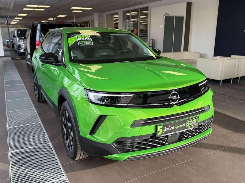 Gebraucht Opel Mokka Elegance 131 PS (96 kW) 2024 Matcha green SUV