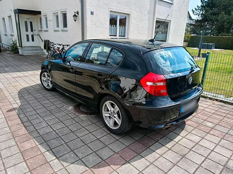 Second-hand BMW 116 122 CP (89 kW) 2010 Negru Hatchback