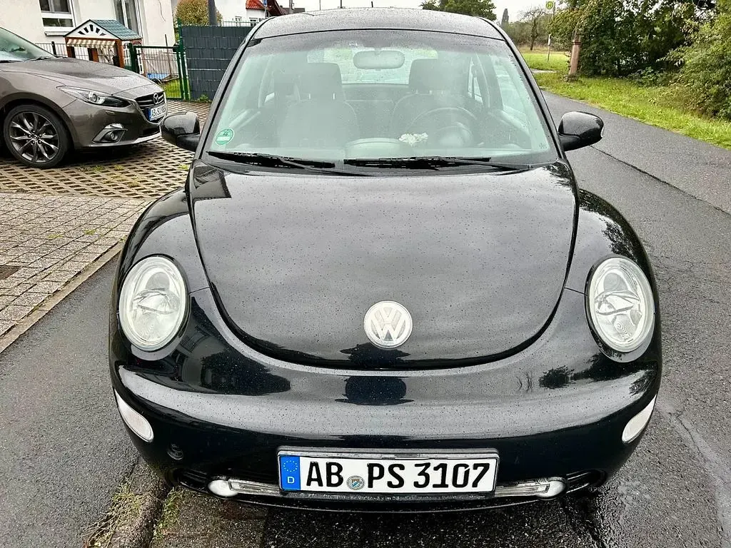 Gebraucht VW New Beetle 102 PS (75 kW) 2004 Schwarz Kleinwagen