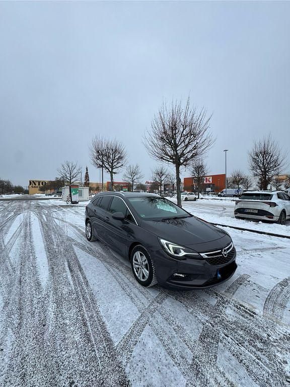 Grau Gebraucht 2016 Opel Astra Active Kombi | 6.900 € (Fairer Preis) - Bild 1/4