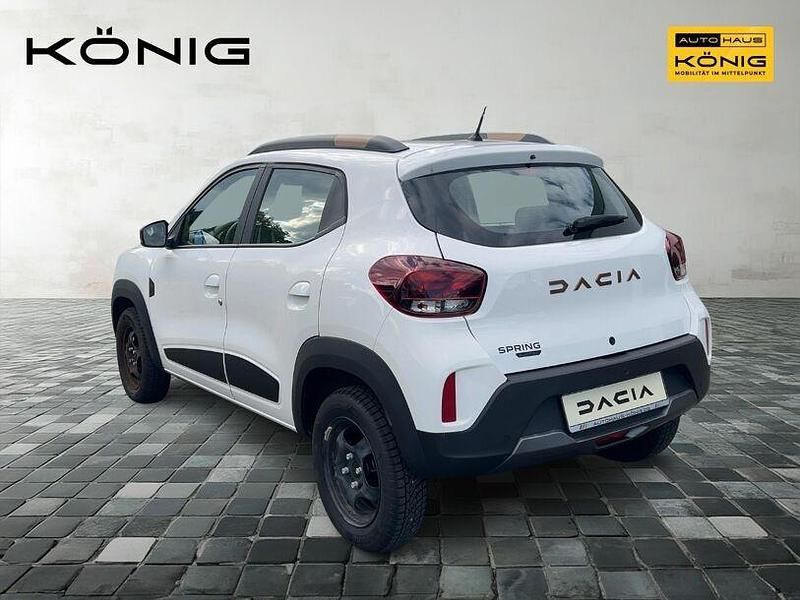 Gebraucht Dacia Spring Extreme 47 kW (65 PS) 2023 Kaolinweiß Kleinwagen