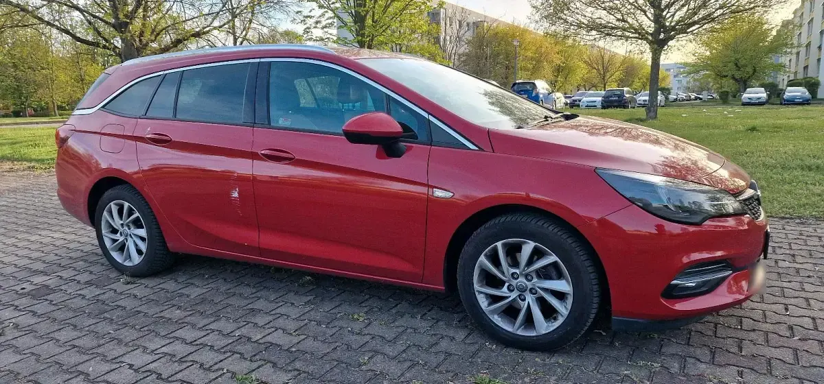 Używany Opel Astra 145 KM (106 kW) 2021 Czerwony Kombi