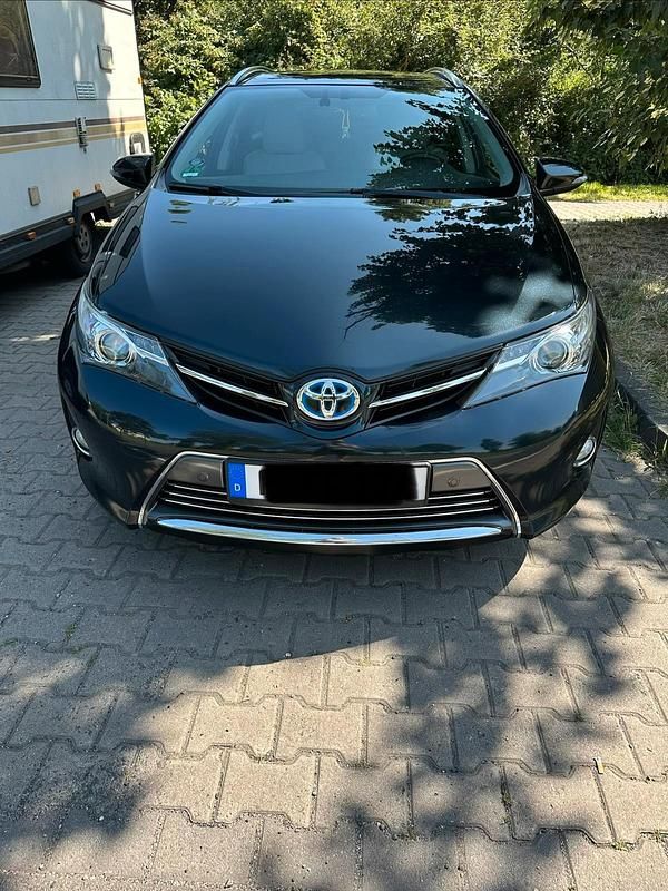 Gebraucht Toyota Auris Hybrid 100 PS (73 kW) 2014 Blau Kombi
