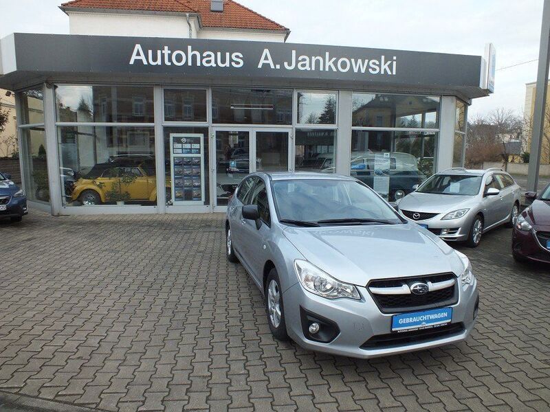 Silber Gebraucht 2013 Subaru Impreza Active Kombi | 9.970 € - Bild 1/4