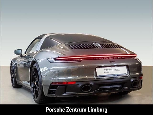 Gebraucht Porsche 992 480 PS (353 kW) 2023 Aventuringrünmetallic Coupé