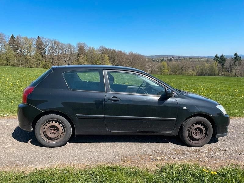 Schwarz Gebraucht 2004 Toyota Corolla Sol Limousine | 2.200 € (Fairer Preis) - Bild 1/4