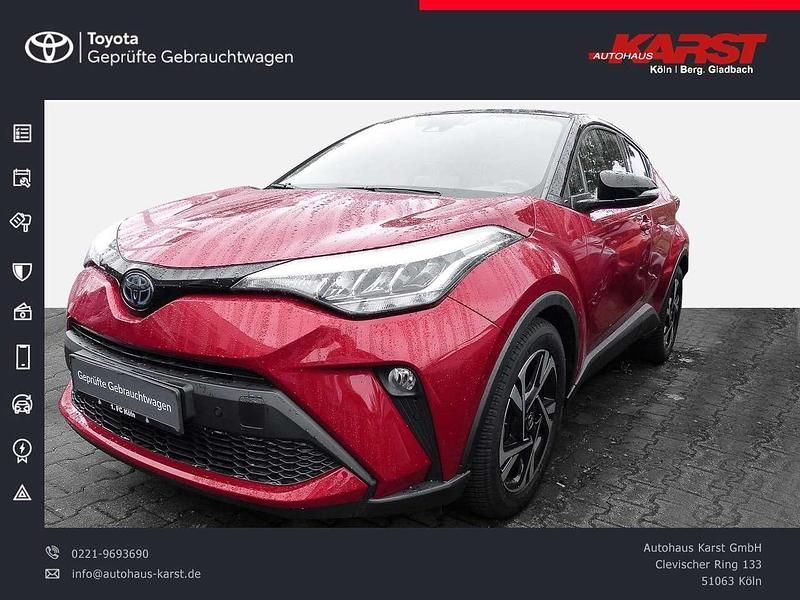 Karminarot metallic / dach schwarz Gebraucht 2022 Toyota C-HR Team SUV | 23.785 € (Fairer Preis) - Bild 1/4