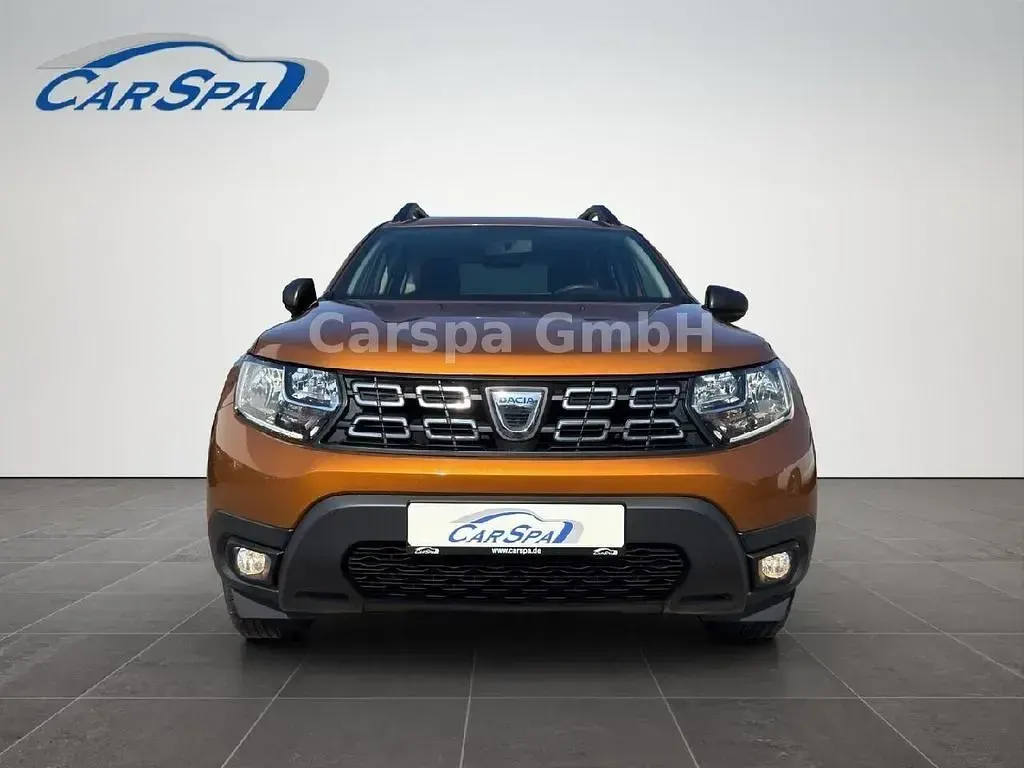 Używany Dacia Duster Comfort 101 KM (74 kW) 2020 Pomarańczowy SUV