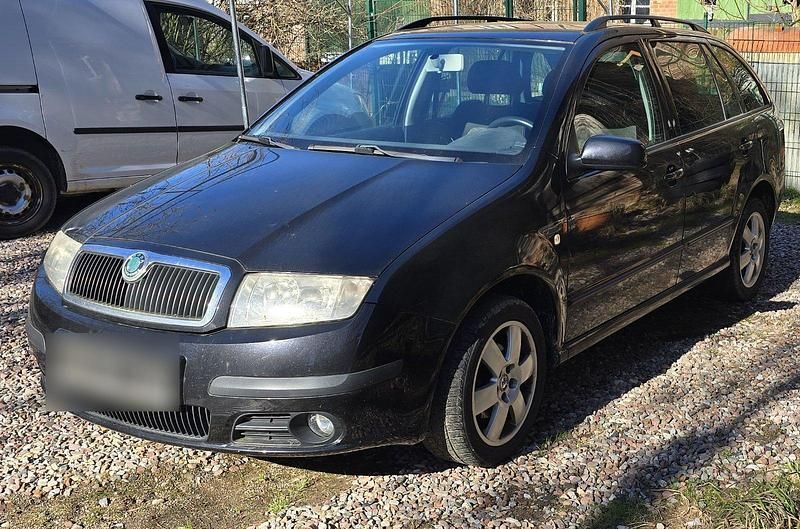 Używany Skoda Fabia 80 KM (58 kW) 2007 Czarny Kombi