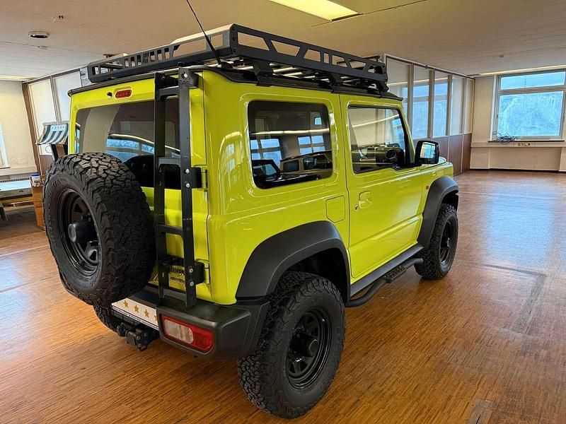 Gebraucht Suzuki Jimny Comfort+ 102 PS (75 kW) 2020 Kinetic yellow/bluish black SUV