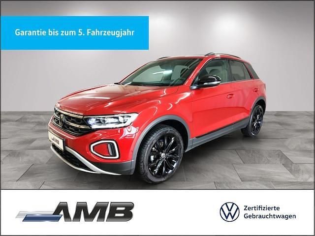 Kings red metallic Gebraucht 2024 VW T-Roc Style SUV | 27.970 € (Fairer Preis) - Bild 1/3