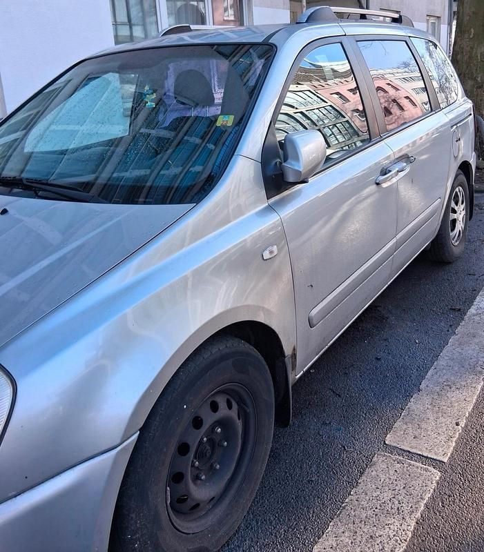 Gebraucht Kia Carnival 185 PS (136 kW) 2006 Silber Van / Kleinbus