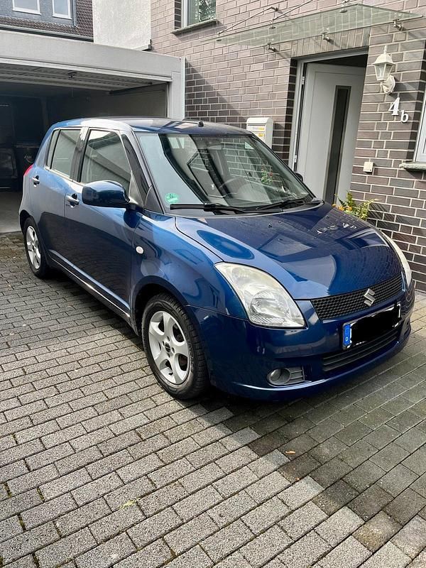 Blau Gebraucht 2005 Suzuki Swift Kleinwagen | 1.350 € (Fairer Preis) - Bild 1/4