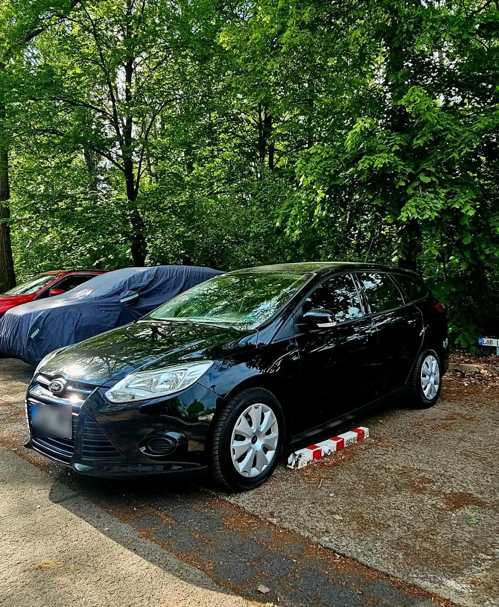 Używany Ford Focus 96 KM (70 kW) 2014 Czarny Kombi