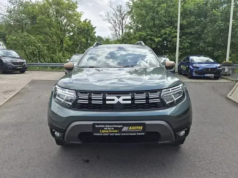 Second-hand Dacia Duster Extreme 150 CP (110 kW) 2023 Portocaliu SUV