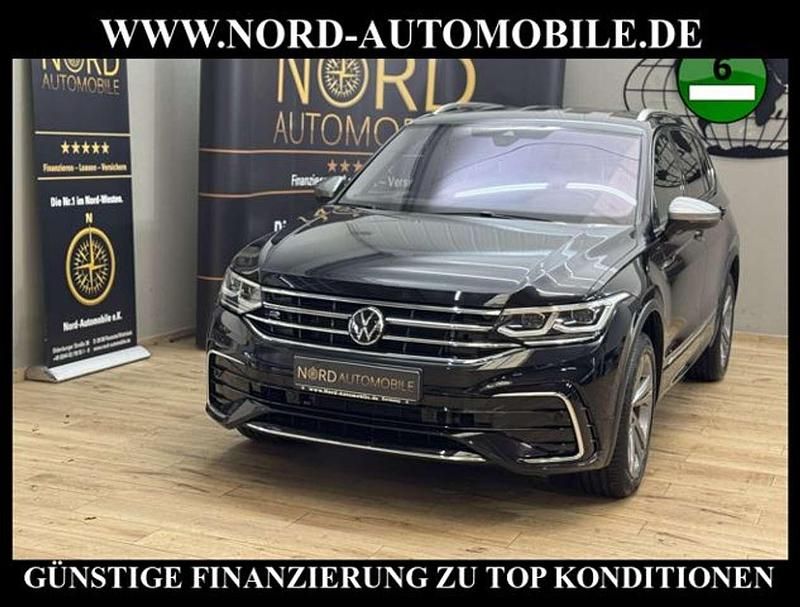 Deep black perleffek (metallic) Gebraucht 2022 VW Tiguan Allspace R-line SUV | 37.900 € (Fairer Preis) - Bild 1/3