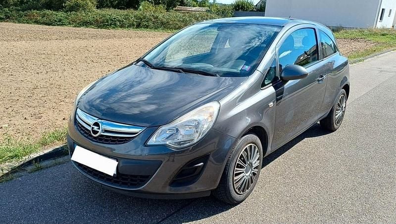 Grau Gebraucht 2012 Opel Corsa Limousine | 3.150 € (Fairer Preis) - Bild 1/4