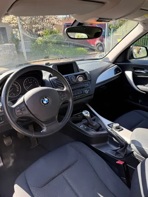 Second-hand BMW 114 102 CP (75 kW) 2013 Negru Hatchback