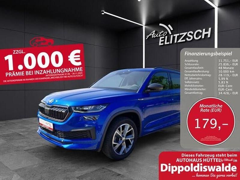 Raceblau metallic met. Gebraucht 2024 Skoda Kodiaq SportLine SUV | 39.870 € (Fairer Preis) - Bild 1/3