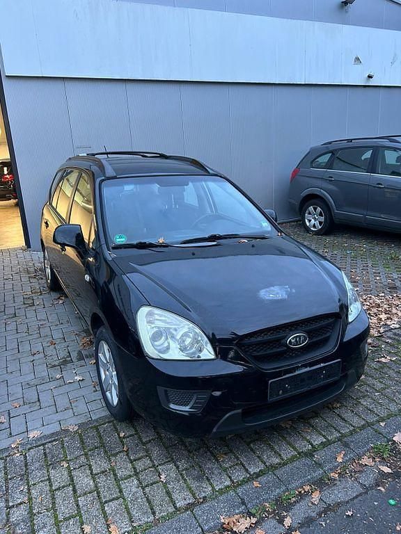 Schwarz Gebraucht 2008 Kia Carens Basis Van / Kleinbus | 1.900 € (Fairer Preis) - Bild 1/4