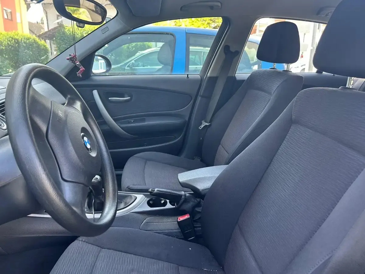 Second-hand BMW 116 122 CP (89 kW) 2008 Negru Hatchback