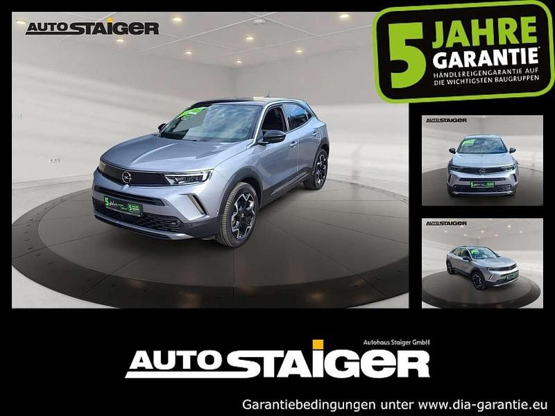 Gebraucht Opel Mokka Ultimate 131 PS (96 kW) 2023 Kontrast grau/quarz silber SUV