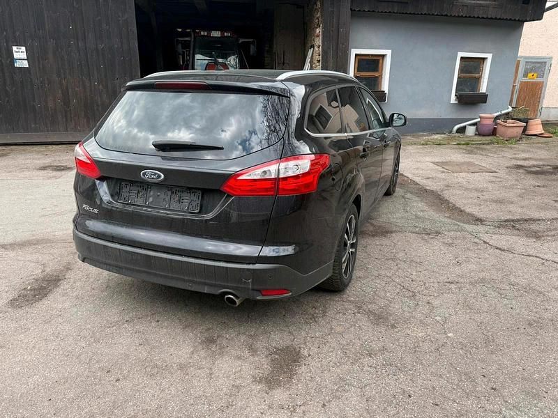 Second-hand Ford Focus Titanium 150 CP (110 kW) 2011 Negru Break