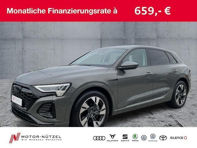 Chronosgrau metallic Gebraucht 2024 Audi Q8 e-tron S-Line SUV | 49.630 € (Superpreis) - Bild 1/4