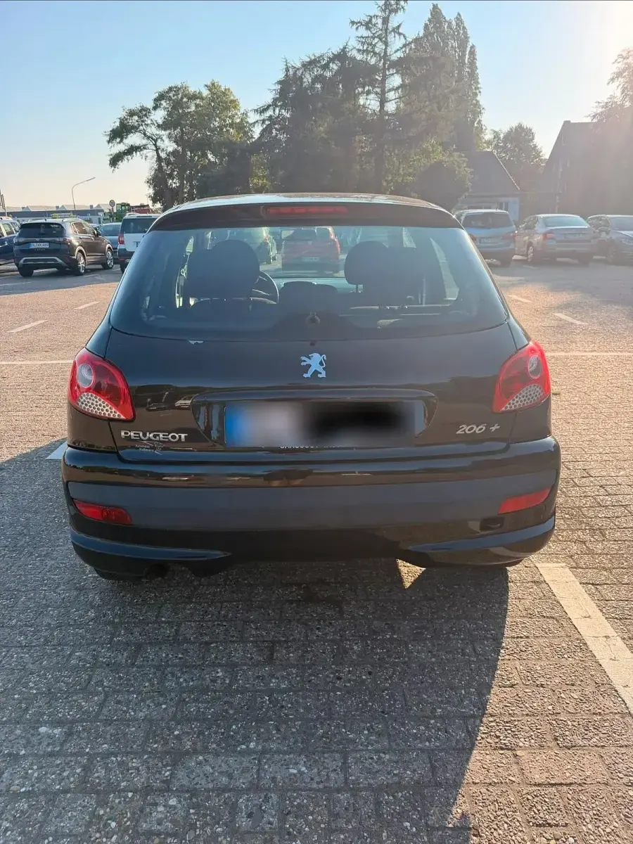 Gebraucht Peugeot 206 73 PS (53 kW) 2011 Schwarz Limousine